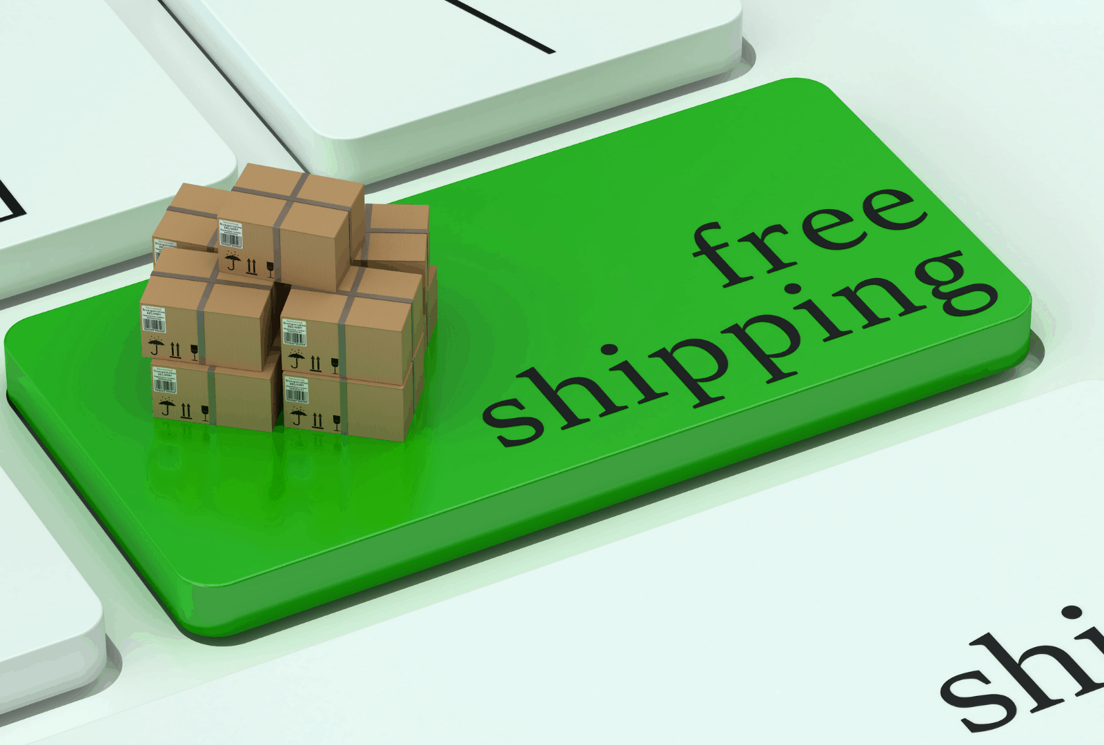 Free Shipping written on bright green button on laptop stacked with brown boxes